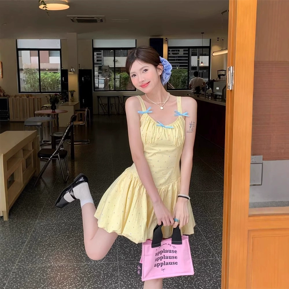 Сладкая пряная девушка желтое подтяжка платье женский летний минус бант складка юбка бутон юбка красивая юбка