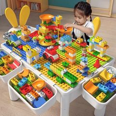 子供の多機能の積み木のテーブルの大きい粒子の赤ちゃんはおもちゃを詰めます。