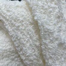 厂家直销弹力起泡泡柔软透气童装女装连衣裙外单面料童裙礼服布料