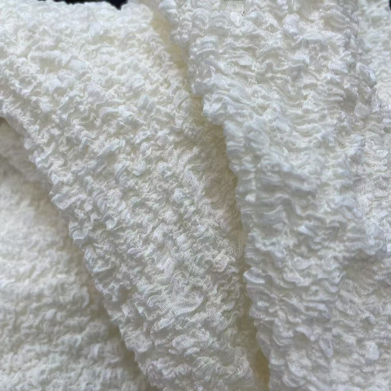 厂家直销弹力起泡泡柔软透气童装女装连衣裙外单面料童裙礼服布料