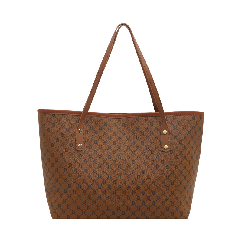 Bolsos sencillos y de moda de gran capacidad para mujer 2025 primavera nuevo bolso de moda bolso de hombro portátil de gran capacidad para viajeros