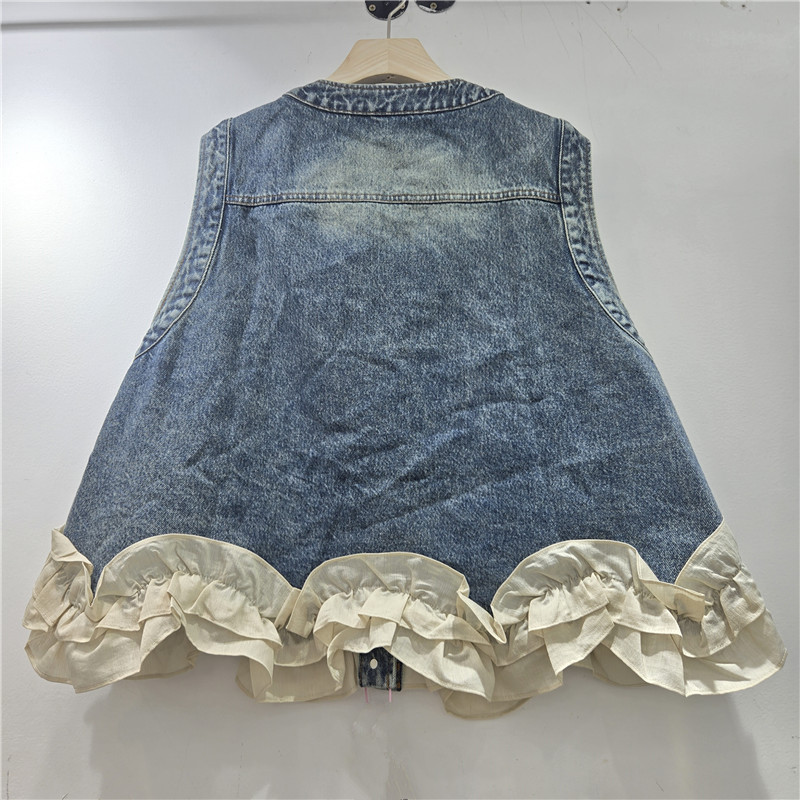 Estación europea 2026 primavera nueva moda europea de mujer de moda versátil borde de loto industria pesada bordado chaleco denim de contraste