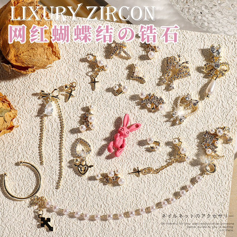 Joyería de uñas arco LZ ZIRCON Super flash perla chica Rosa cadena metal colgante cráneo conejo Decoración