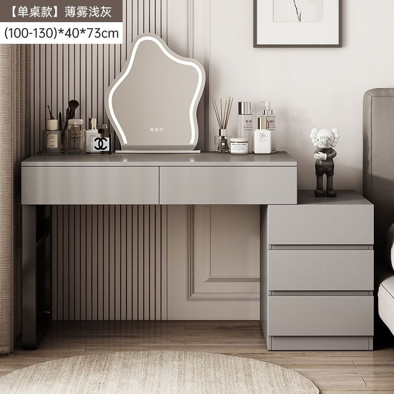 Wardrobe de madera maciza de tabla de roca dormitorio moderno simple pequeño tipo de lujo ligero de alta sensación armario de maquillaje en casa