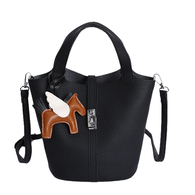 Bolsa de cestas de comida de mano de alta calidad 2025 nuevo invierno simple bolso de cubo casual bolso de hombro de mujer coreana