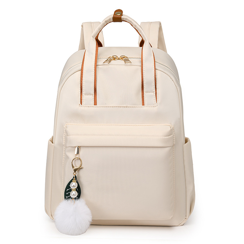 Mochila multiusos de gran capacidad para viajeros, nueva moda de color sólido, mochila de tela Oxford simple y versátil, viaje de gran capacidad