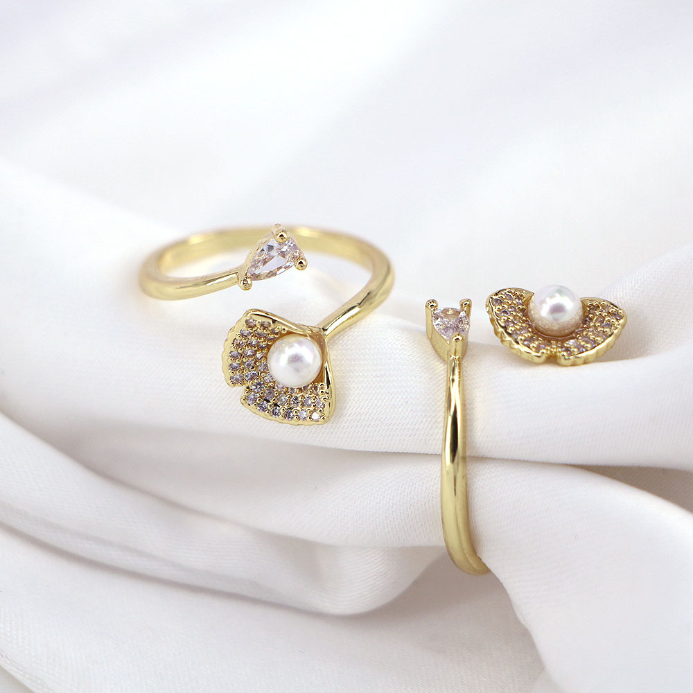 Fashion Micro-encrusted Zircon Pearl Copper Female Simple Opening Creative Ring display picture 3