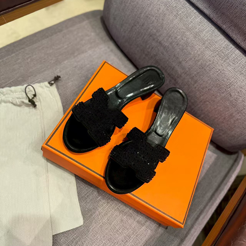 鼎羊皮の新型真皮平底ネット赤同タイプのスリッパ女性夏外着一字引きビーチカジュアル太さと涼しさ引き