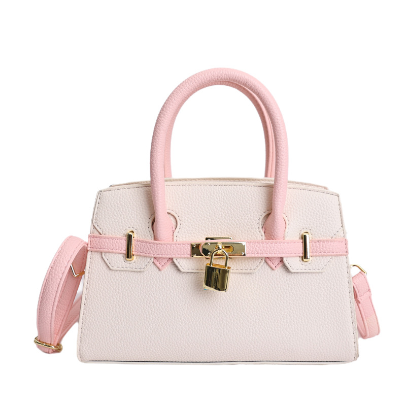 Coreano simple bolso de mano mujer 2026 primavera nueva bolsa de viaje diario texturizada bolso de mochila