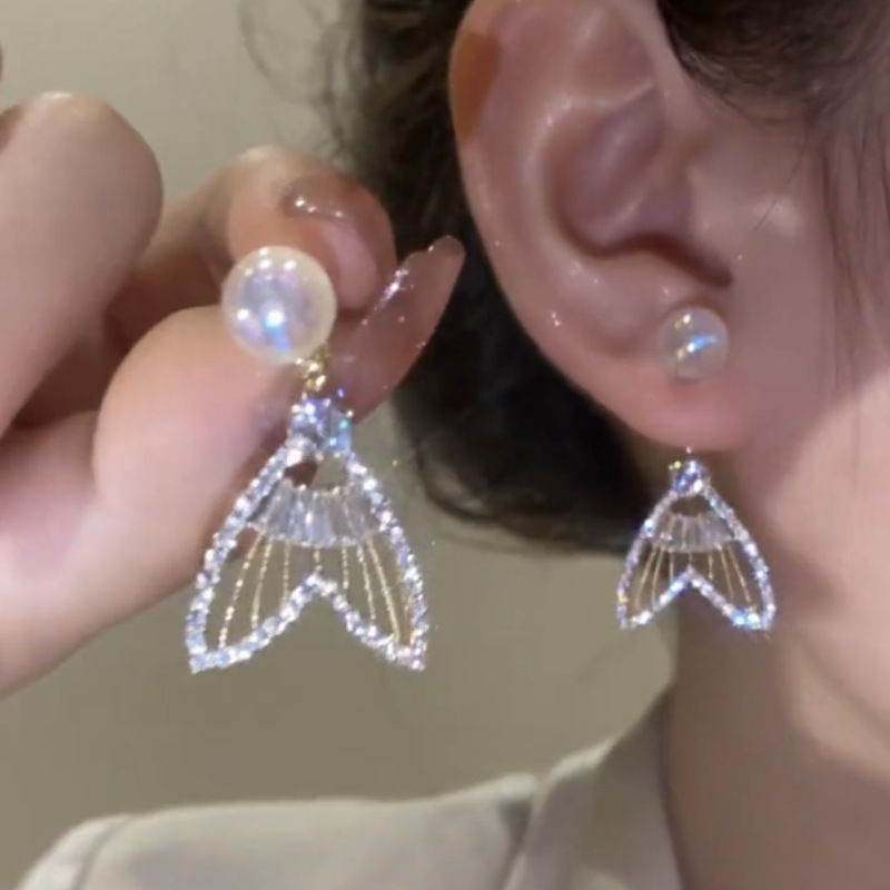 Designer style exquisite mermaid fish tail earrings, niche design earrings, high-end feeling, light luxury hollow earrings_voghion.com