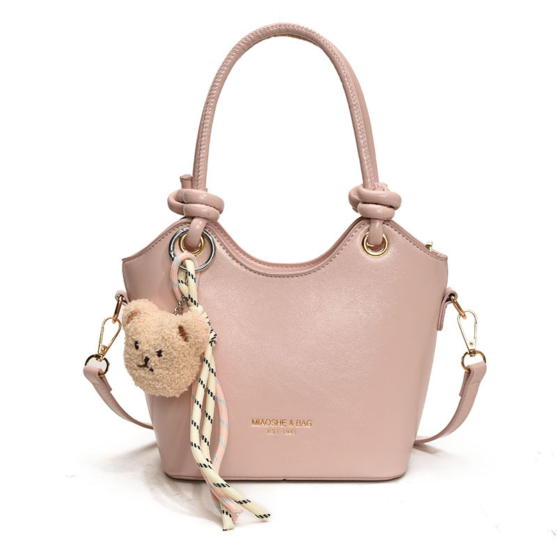 Popular ultra caliente bolso de cubo de mano para mujeres 2025 nuevo nicho Zhong universal bolso de viaje casual simple mochila de hombro