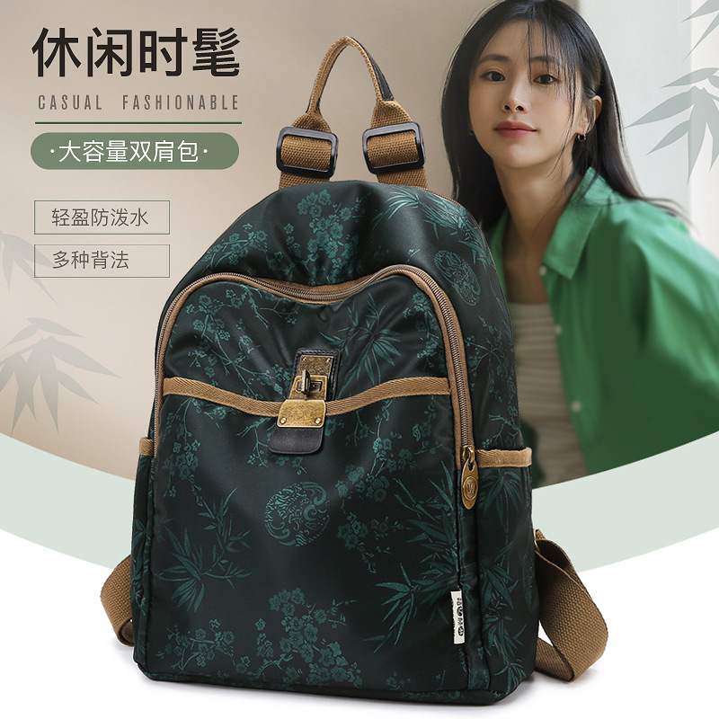 潮牌印花牛津布双肩背包时尚新款休闲轻便大容量旅游出差手提情侣