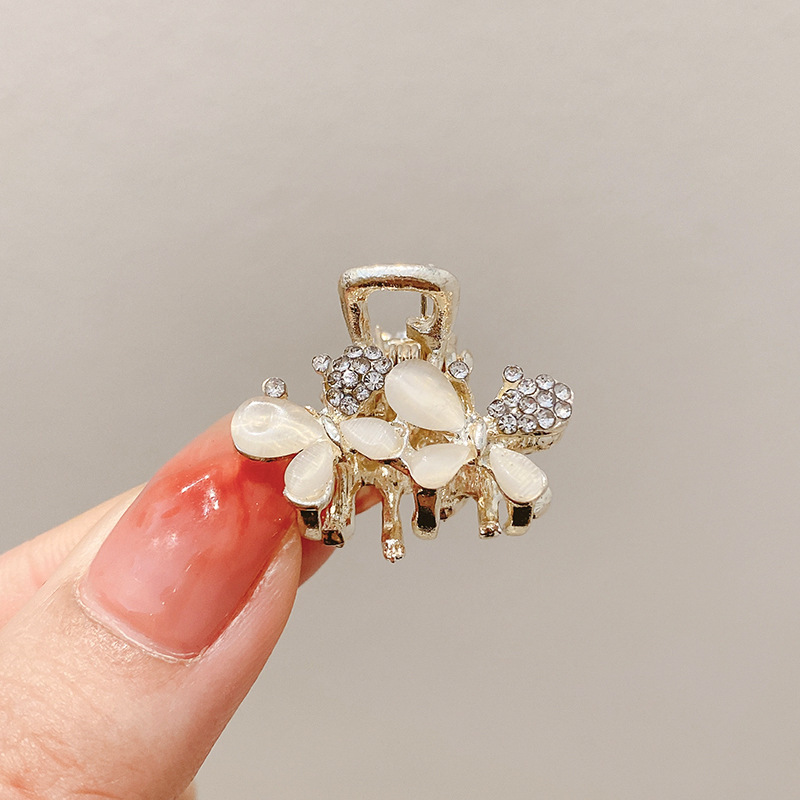 Diamantes de imitación de mariposa doble ojo de gato