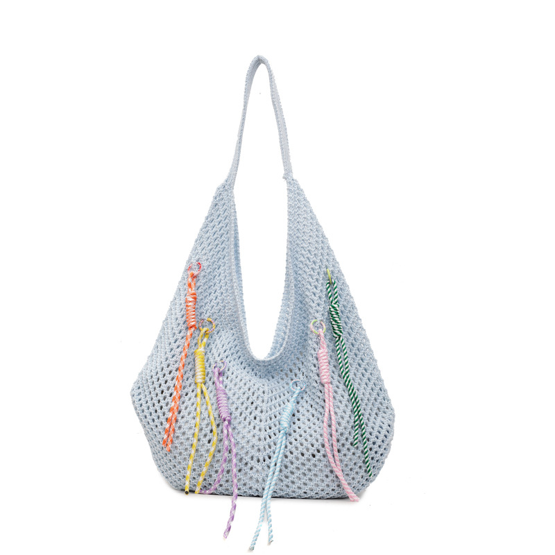 Versión coreana del bolso de nicho 2025 verano nuevo bolso de hombro de punto hueco bolso de mensajero de gran capacidad mujer