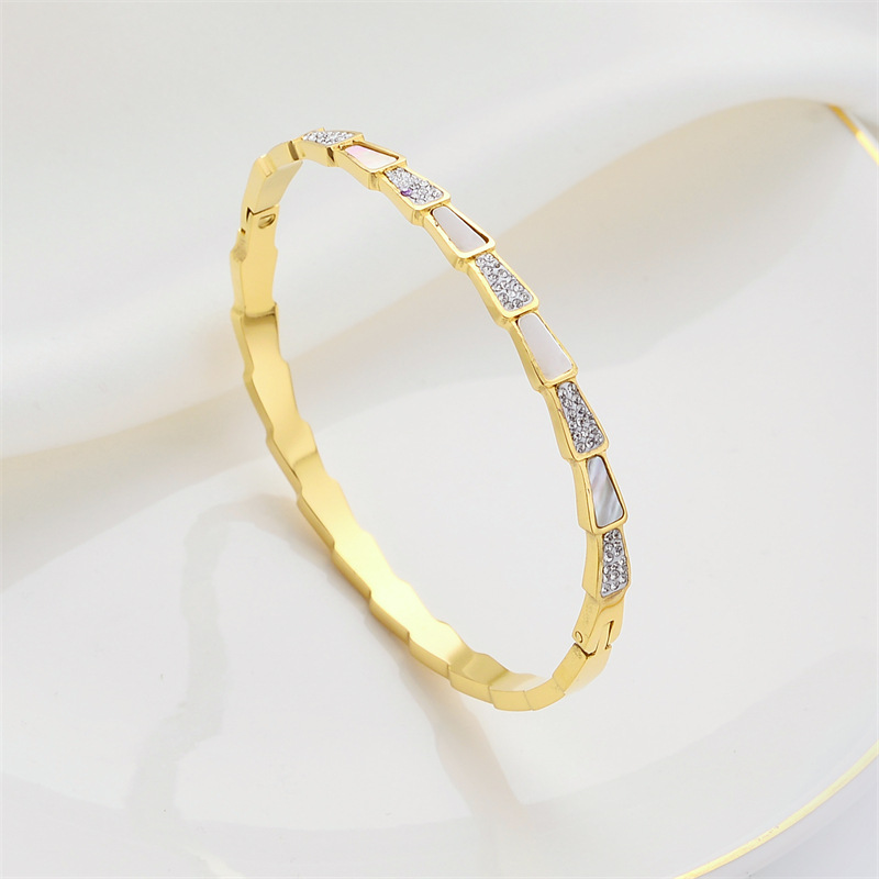 Pulsera de titanio y acero para mujer, diseño moderno y sencillo, pulsera de lujo que no se desvanece, venta al por mayor en stock.