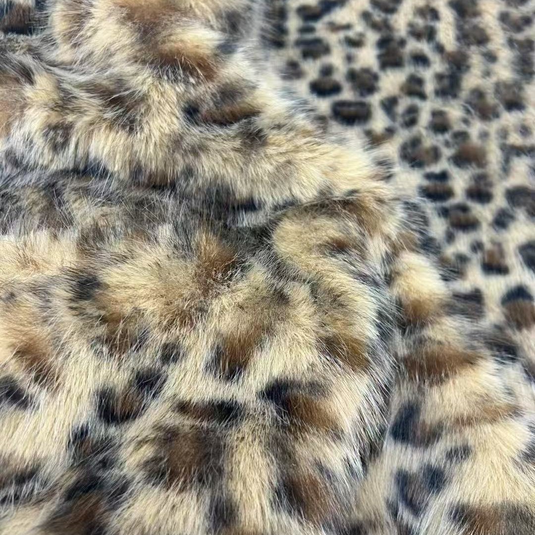 Nuevos productos de tela de impresión de leopardo de zorro dorado imitación de tela de tela de peluche de tela de muñeca de ropa de piel de leopardo