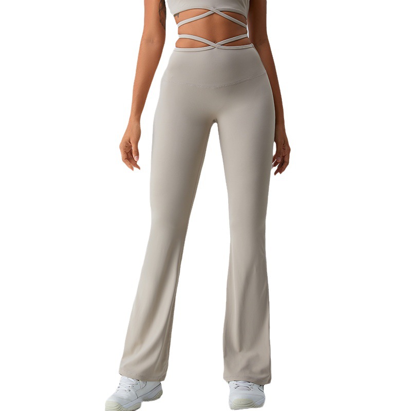Cintura transfronteriza Correa delgada pantalones cruzados de yoga pantalones de pierna ancha de cintura alta desnuda de mujer corriendo deportes fitness ropa de yoga