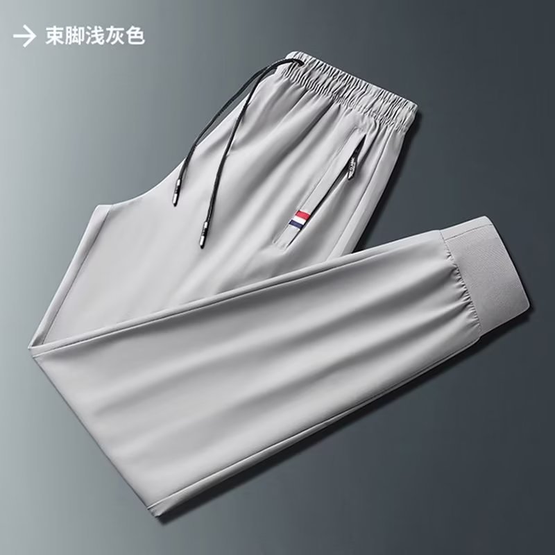 Pantalones de los hombres de verano Delgado estilo coreano de moda estilo coreano de seda de hielo transpirable pantalones casuales marca de moda Pantalones deportivos a juego