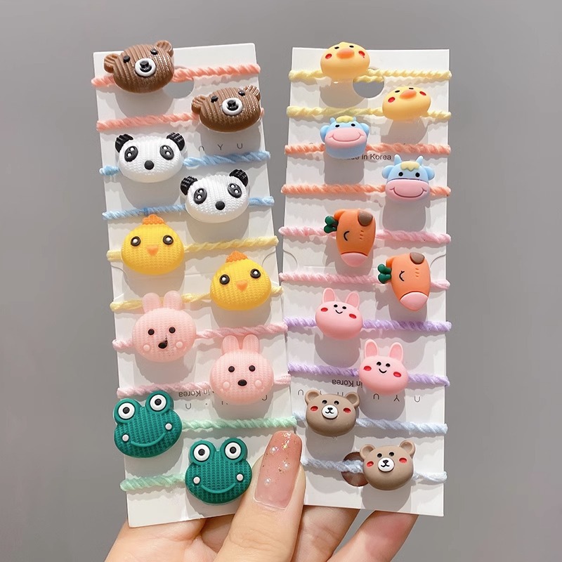 La cuerda del pelo del bebé de las muchachas de la banda de goma de los niños no lastima el pelo Los accesorios del pelo del pulgar del tamaño pequeño atan la banda de goma del pelo