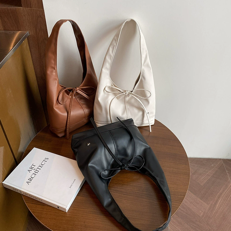 Small design universal capacious one-shoulder bag for leisure with bow, shoulder bag