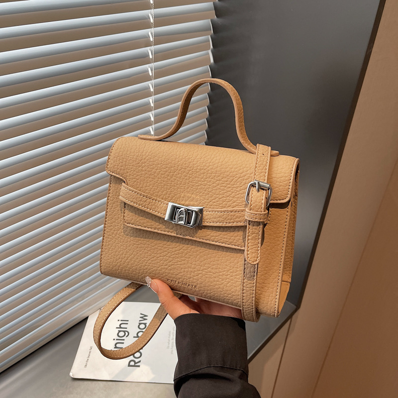 Sentido diario bolso pequeño para mujeres nuevo 2026 textura bolso de mano de transporte de moda ocio de hombro de tramo inclinado gris