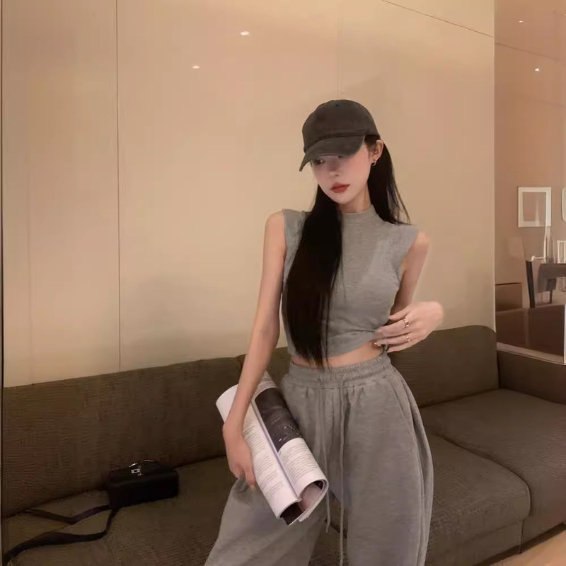 白の短い袖のないベストtシャツの女性の春夏の新型は腰のガードルの一体式の副乳の底のシャツの上着を収めます。|undefined
