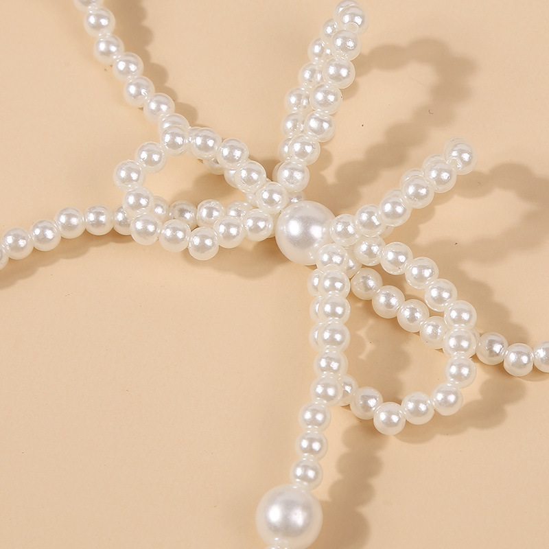 Korean Cute Pearl Bow Necklace display picture 7
