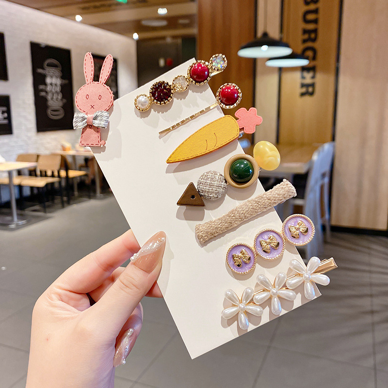 Clip de flequillo lateral rojo de la red femenina 2025 nueva horquilla simple clip de una línea horquilla clip de cabello roto tocado clip de pico de pato