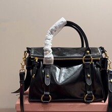 时尚复古油蜡皮亮漆皮蝴蝶结手提公文包机车包pu日常通勤购物袋女