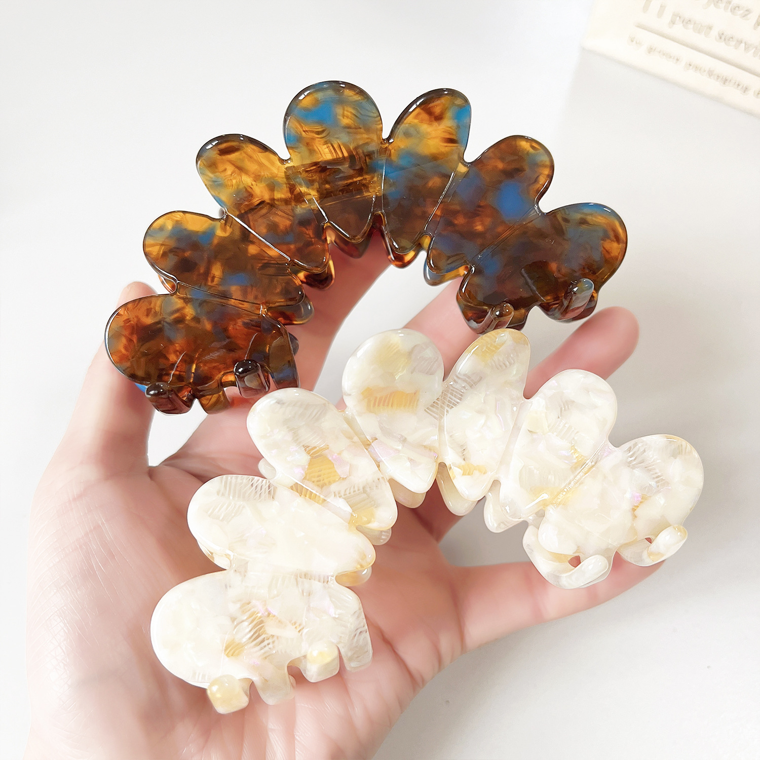 Acetato francés coreano agarrar clips de flores de alto nivel de sensación de cabeza trasera temperamento de cabello universal nicho de diseño de mujeres