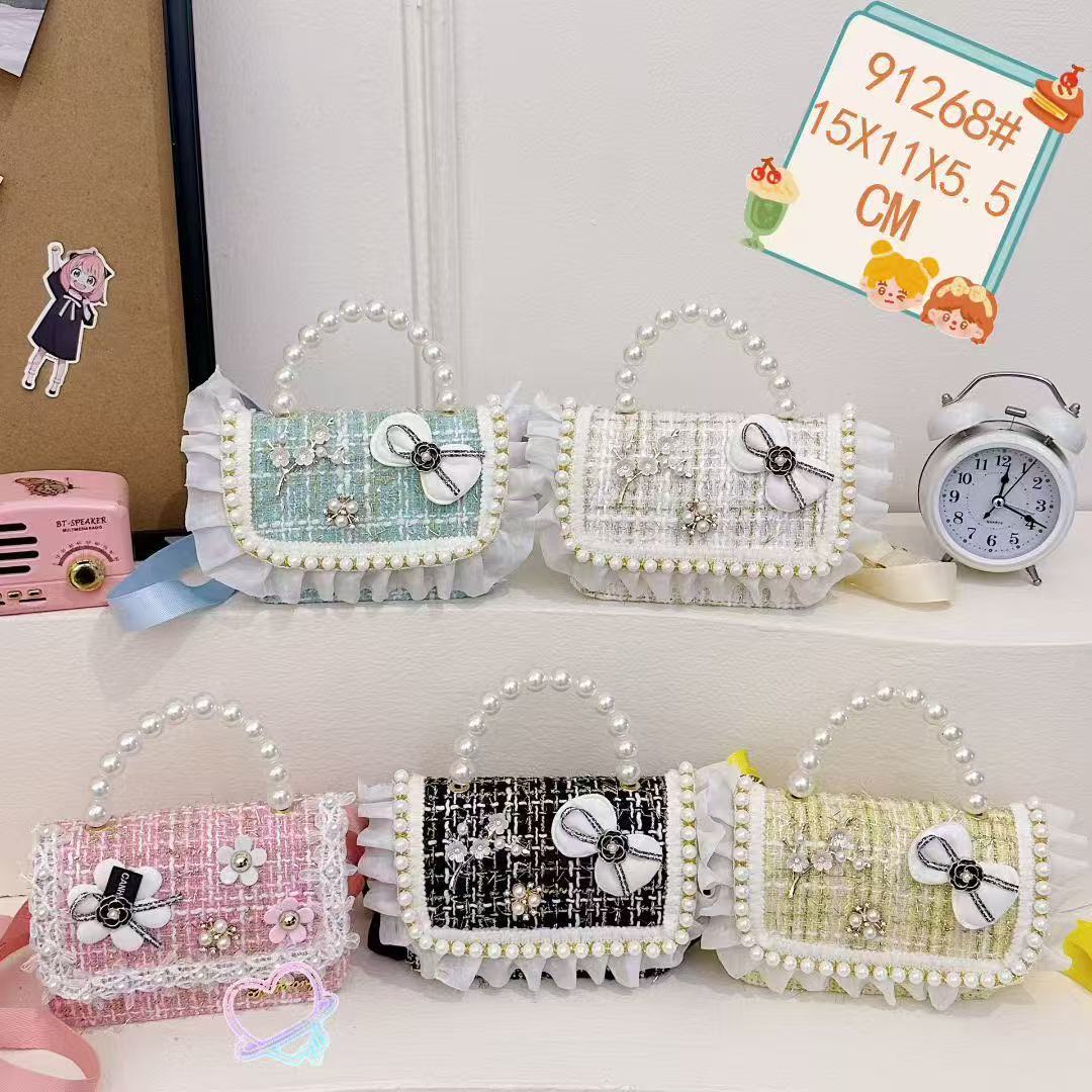 2025 nuevo estilo coreano de viento de fragancia mini niñas princesa de perlas portátil hombro único accesorios bolsos para niñas