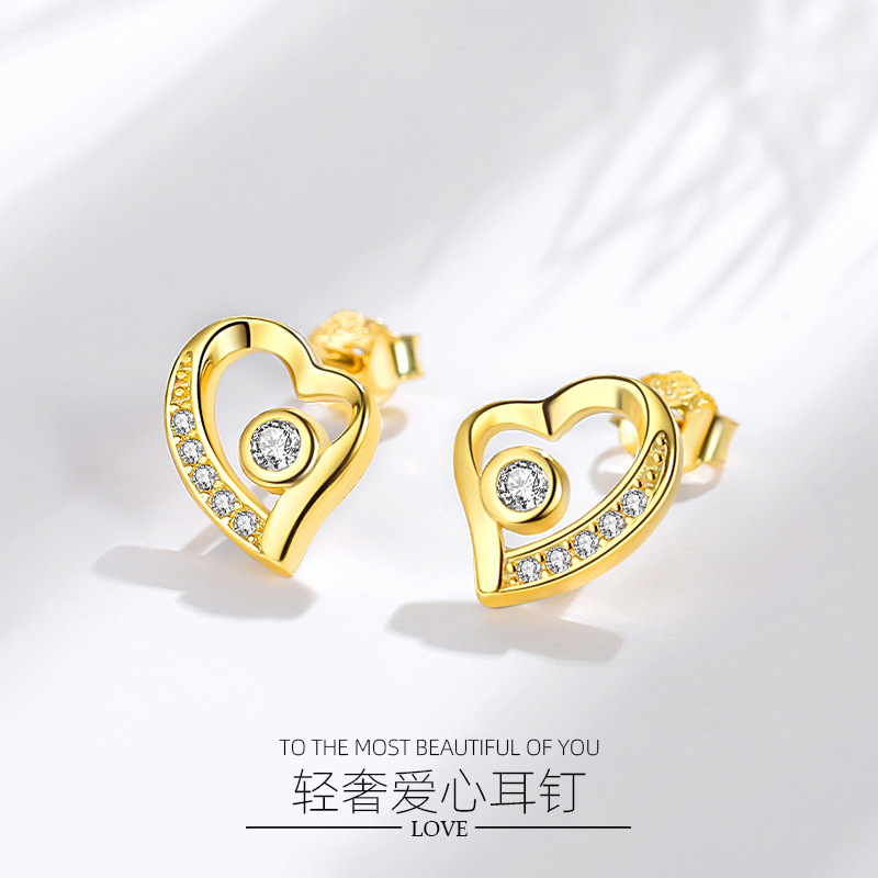 Pendientes de plata esterlina S925 pendientes encantadores de plata de aguja de plata 925 al por mayor pendientes de estilo europeo y americano en forma de corazón incrustados en diamantes para mujeres