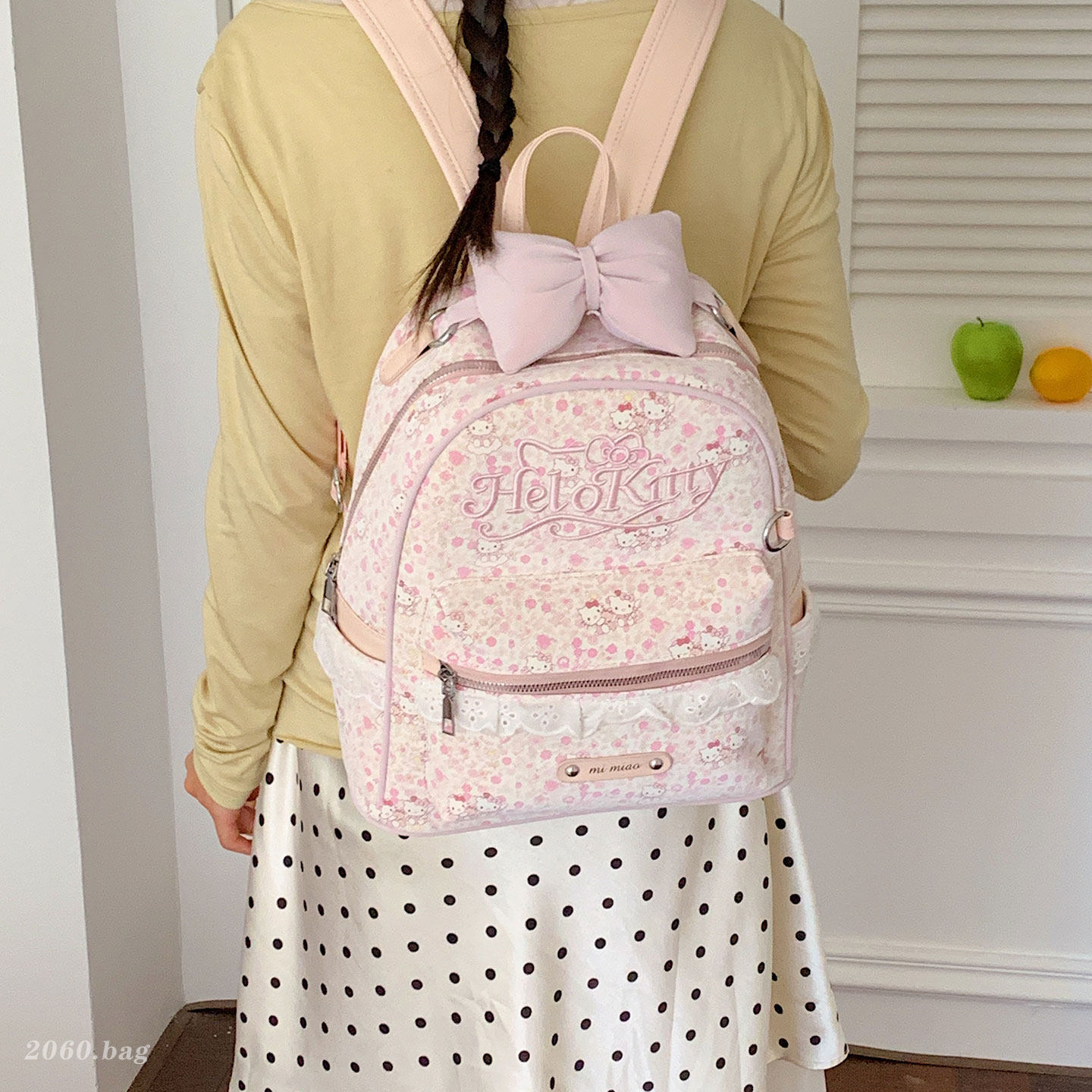 Flores de viaje femenina 2026 clase caricatura lindo nuevo tipo de mochila gato arco mochila de viaje