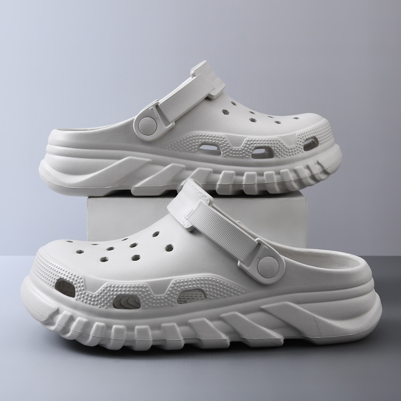 Pareja de zapatos con agujeros zapatillas frescas de verano EVA hombres y mujeres al aire libre moda ligero color sólido Baotou zapatos de playa de suela blanda al por mayor