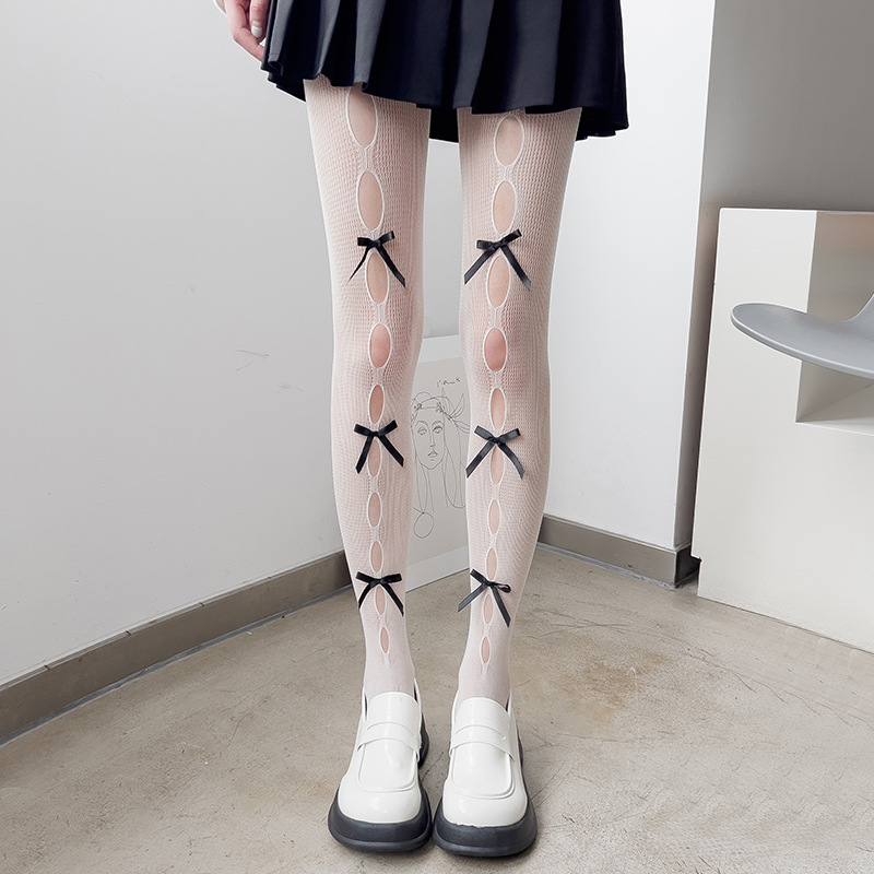 Ripped bowknot primavera y verano Delgado JK Internet celebridad sexy negro malla calcetines ins moda estilo japonés oscuro hueco calcetines de fondo