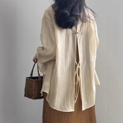 新中国式のボタンの薄い天糸の日焼け止めのシャツの女性の夏は長袖の上着の国風のカジュアルでゆったりしているシャツを開きます。