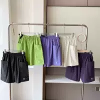 300502. Qingdao Warehouse Женские летние однотонные лоскутные повседневные быстросохнущие дышащие спортивные шорты в корейском стиле с большими карманами.