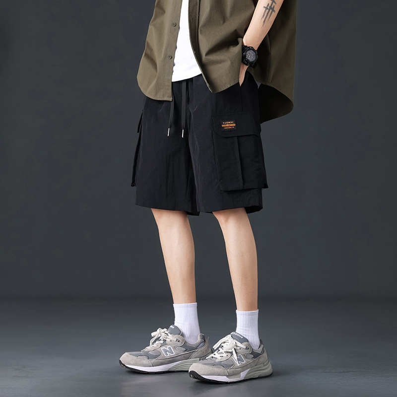 Pantalones cortos de trabajo de seda de hielo para hombres de verano delgados estilo de moda versátil vientos de puerto pantalones casuales deportivos sueltos