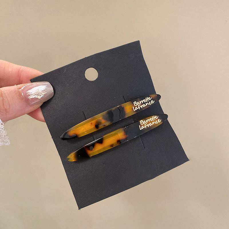 Horquilla florecilla simple primavera y verano nuevo estilo retro moda todo fósforo clip lateral de una palabra sentido de alta calidad temperamento exquisito accesorios para el cabello