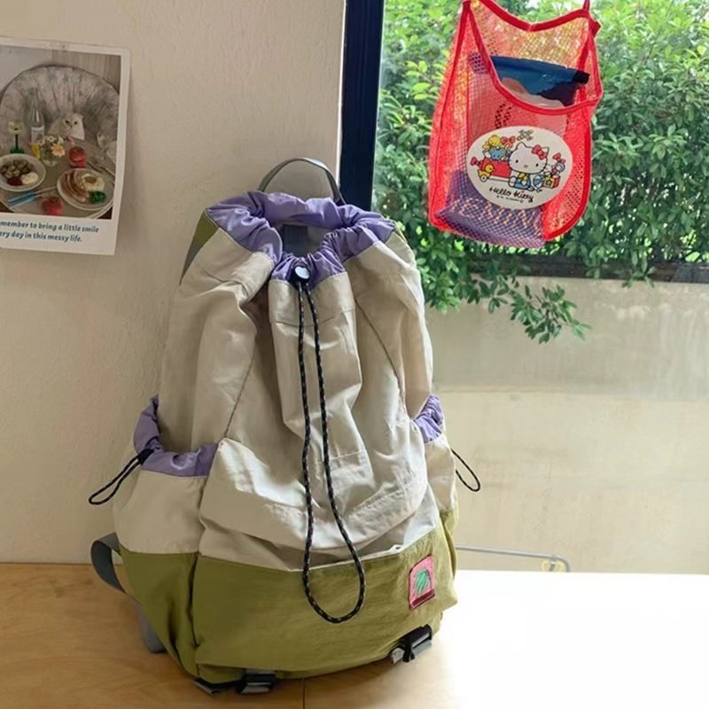 日本乐天 双肩包束口抽绳书包女户外运动登山大容量轻便旅行包男