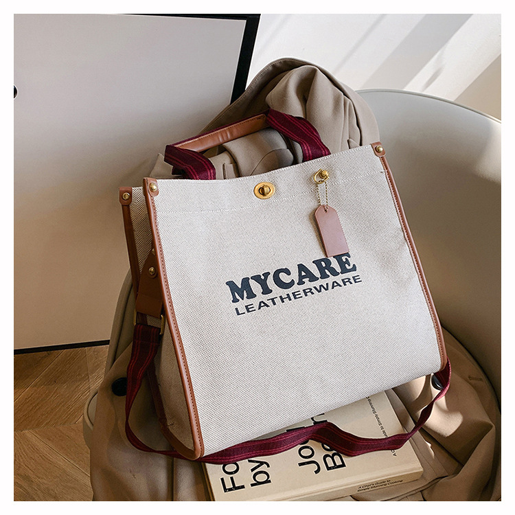 Bolsa de mano de lona de gran capacidad para mujeres 2024 nueva moda impresa letras mochilas bolsa de viaje casual