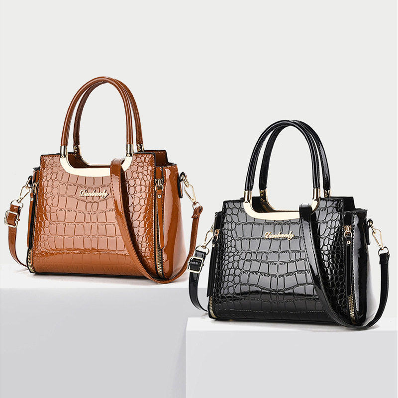 2026 nueva moda esmaltada cocodrilo estampado bolso transfronterizo mujer universal viaje de gran capacidad mochila de hombro