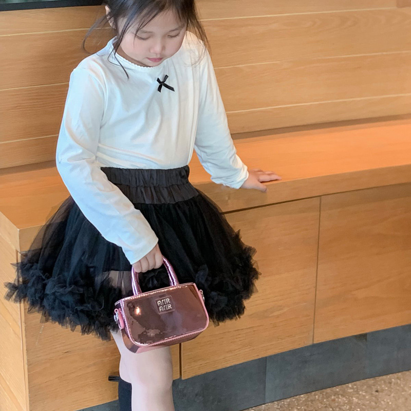 Bolsa de hombro coreana para niñas de color sólido, bolso láser de moda, mini bolso para bebés, 2025 nuevo bolso para niños