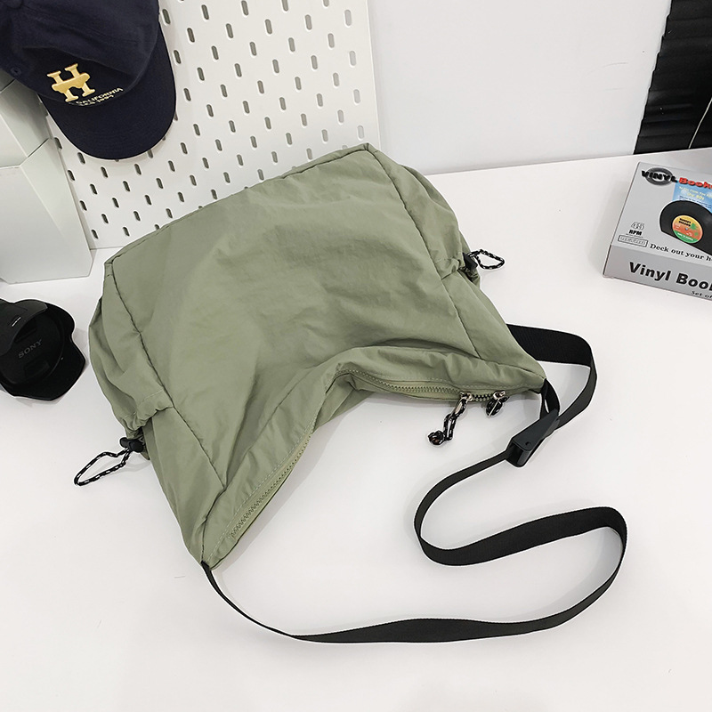 2025 bolsos de hombro, bolsos de mujer hechos a sí mismos, gran capacidad, estilo perezoso, literatura y arte, sencillos bolsos de lavado de agua, bolsos de clase para estudiantes universitarios