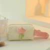 Beige small clutch bag