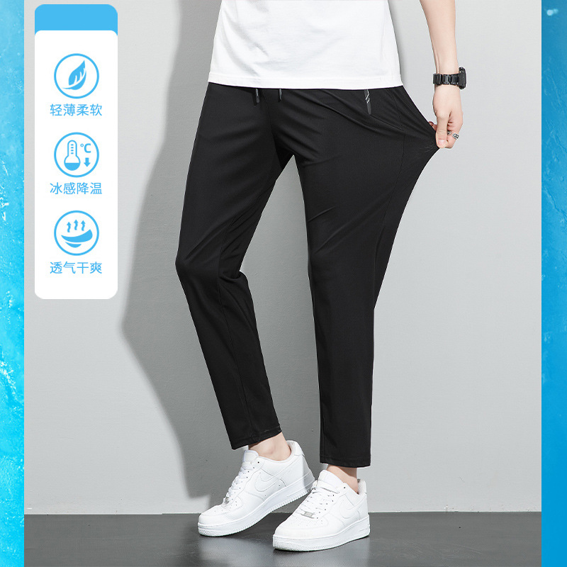 Pantalones de verano de hielo de tamaño grande para hombres pantalones deportivos de barril recto, piernas de ángulo plano sin quemar, secado rápido pantalones casuales al por mayor