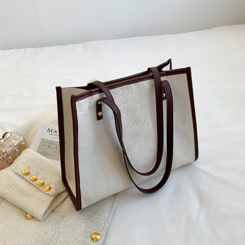 Bolsa de gran capacidad para mujeres otoño / invierno 2022 nueva moda de moda simple atmósfera bolsa de viaje de hombro japonesa bolsa especial