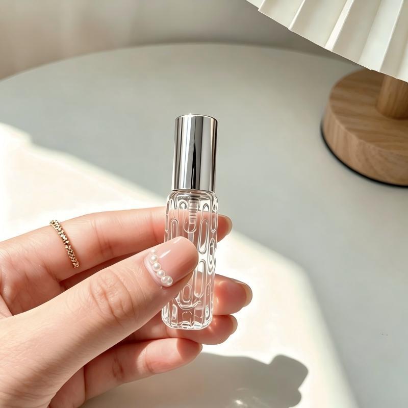 En stock al por mayor 10ml botella de spray de perfume de vidrio rosa de oro boquilla de aluminio perfume sub-botella prensa botella vacía