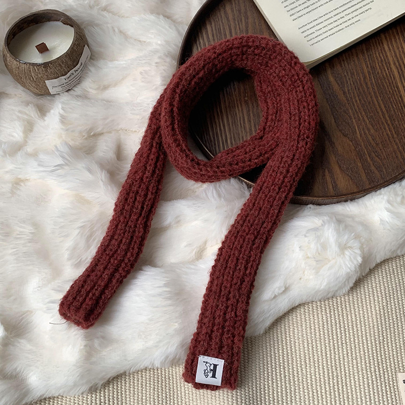 Otoño y invierno bufandas mujeres 2025 nuevo color sólido caliente de protección de cuello de lana de punto largo bufandas al por mayor