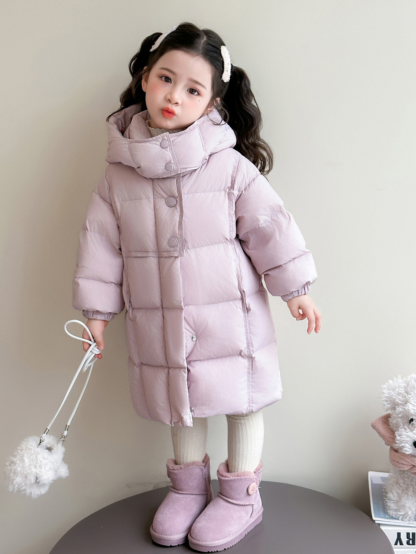 Chaqueta de pluma de niñas mediana y larga invierno 2025 nuevo niño engrosado de moda universal abrigo de invierno cálido chaqueta con capuz